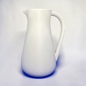 Forgl�det m�lkekande i porcel�nsler