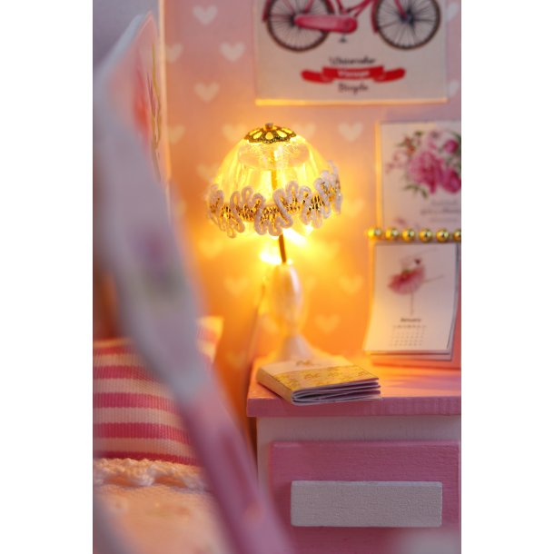 Lyser�dt pigev�relse